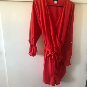 Ladies romper. Size XL Orange. Never worn. NWOT.